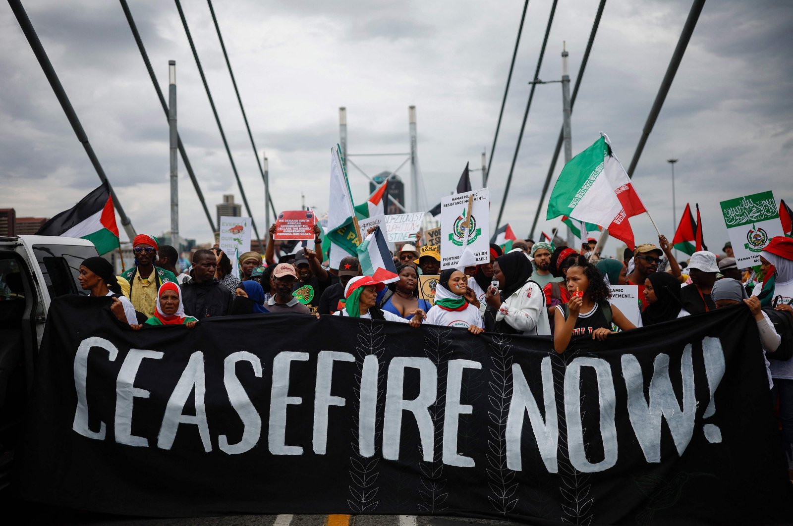Demonstrators carry a banner during a pro-Palestinian demonstration by various political parties and trade unions in Johannesburg, South Africa, Nov. 29, 2023. (AFP Photo)