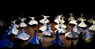Whirling Dervishes practicing for the Mevlana international memorial ceremonies at the Konya Metropolitan Municipality Mevlana Culture Center, Konya, Türkiye, Dec. 2, 2023. (AA Photo)