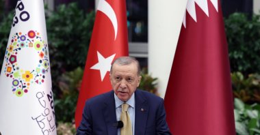 President Recep Tayyip Erdoğan speaks at an event in Doha, Qatar, Dec. 5, 2023. (IHA Photo)