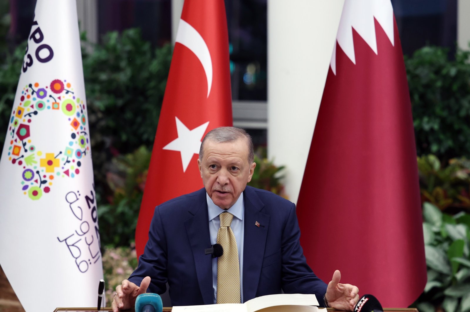 President Recep Tayyip Erdoğan speaks at an event in Doha, Qatar, Dec. 5, 2023. (IHA Photo)