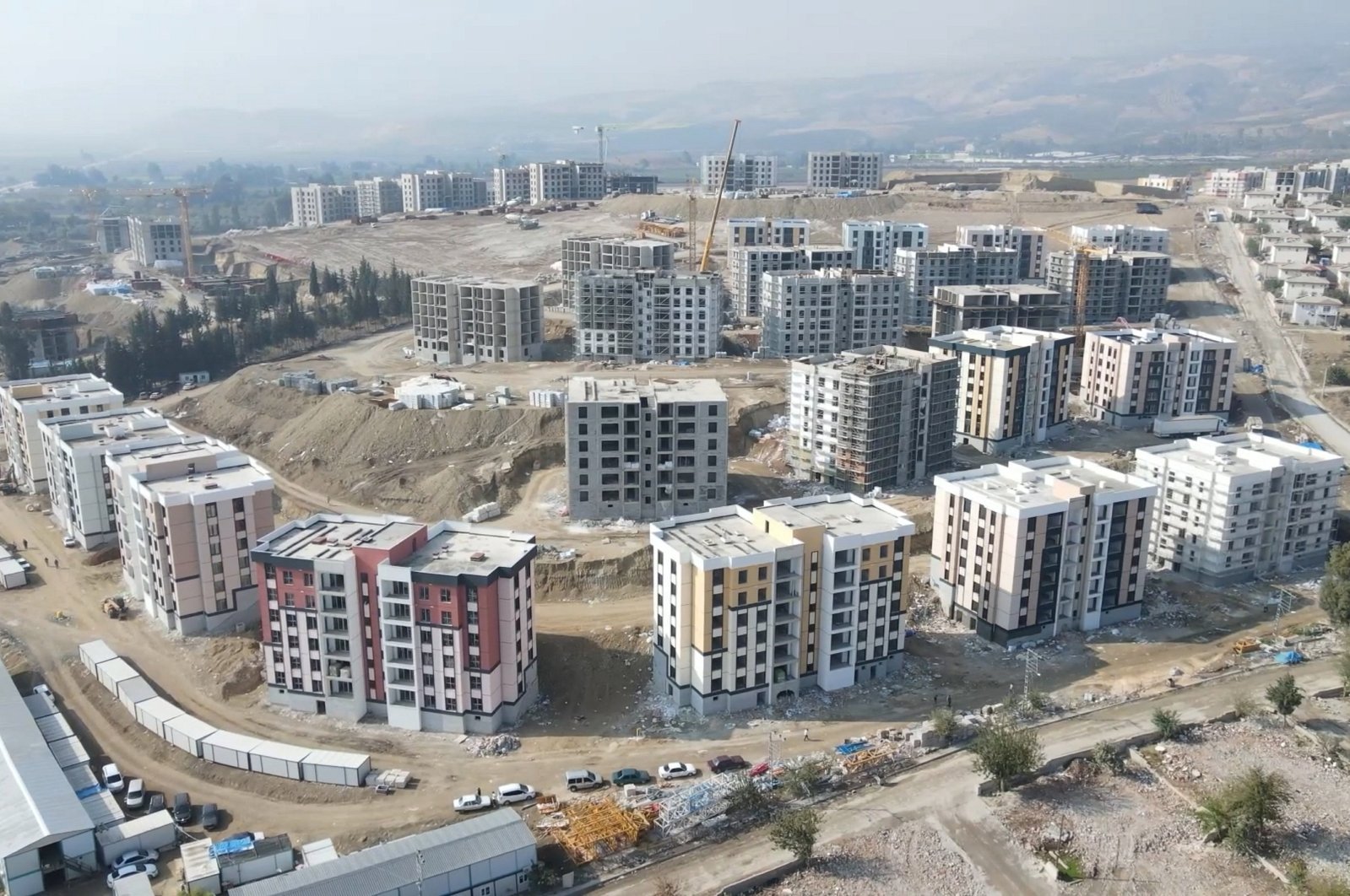 The construction of new housing units continues in quake-hit Hatay, Türkiye, Dec. 7, 2023. (AA Photo)