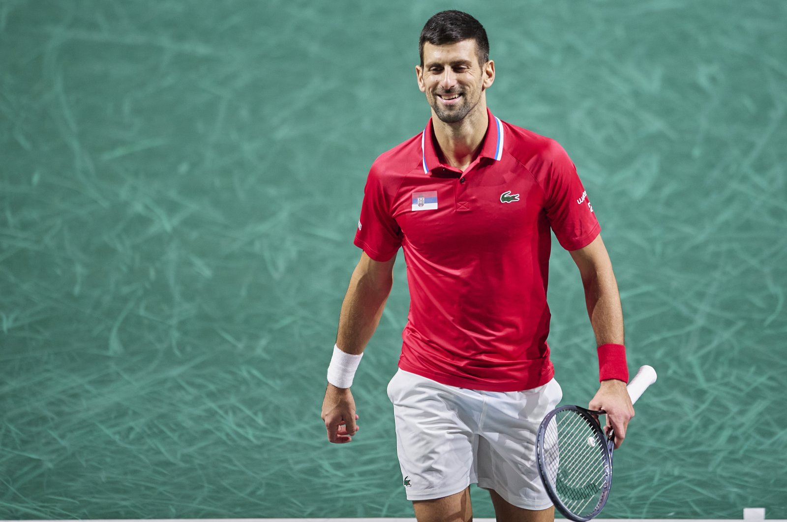 Serbia&#039;s Novak Djokovic looks on during the semifinal match against Jannik Sinner and Lorenzo Sonego of Italy in Davis Cup Final at Palacio de Deportes Jose Maria Martin Carpena, Malaga, Spain, Nov. 25, 2023. (Getty Images Photo)