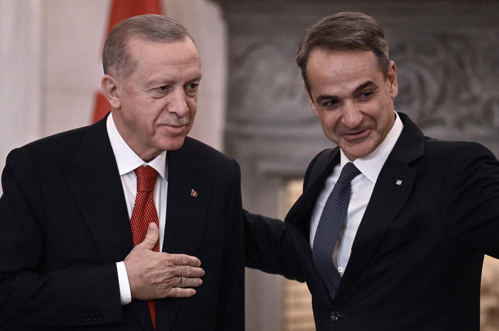 President Recep Tayyip Erdoğan (L) and Greek Prime Minister Kyriakos Mitsotakis leave after speaking to the press following their meeting in Athens during Erdogan&#039;s official visit to Greece, Dec. 7, 2023. (AFP Photo)