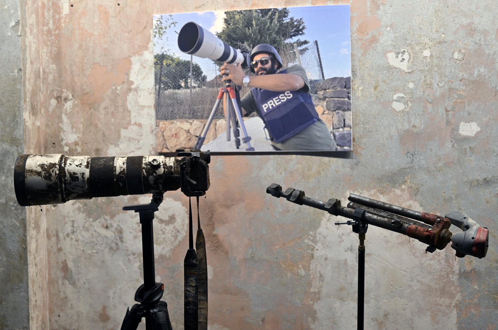 The equipment of killed Reuters journalist Issam Abdallah on display during a press conference in Beirut, Lebanon, Dec. 7, 2023. (EPA Photo)