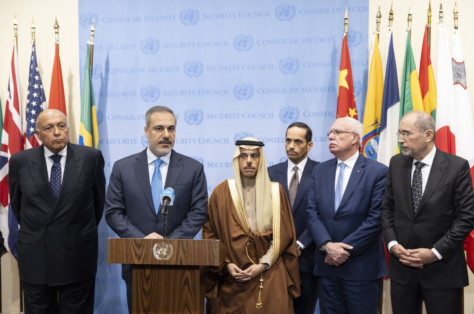 Foreign Minister Hakan Fidan (2nd L) speaks during a press conference with fellow members of the Ministerial Committee assigned by the Joint Arab-Islamic Extraordinary Summit in support of Palestine outside the U.N. Security Council during a meeting on the Israeli-Palestine conflict, U.N. headquarters, New York, U.S., Nov. 29, 2023. (EPA Photo)