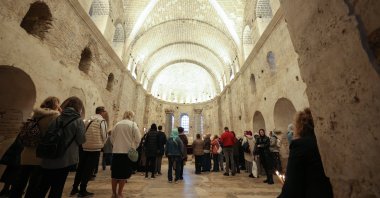 People attend a mass led by Fener Greek Patriarch Bartholomeos for Saint Nicholas, known as &quot;Santa Claus&quot; on the anniversary of his death at St. Nicholas Memorial Museum and Church in Demre district of Antalya, Türkiye, Dec. 6, 2023. (AA Photo)