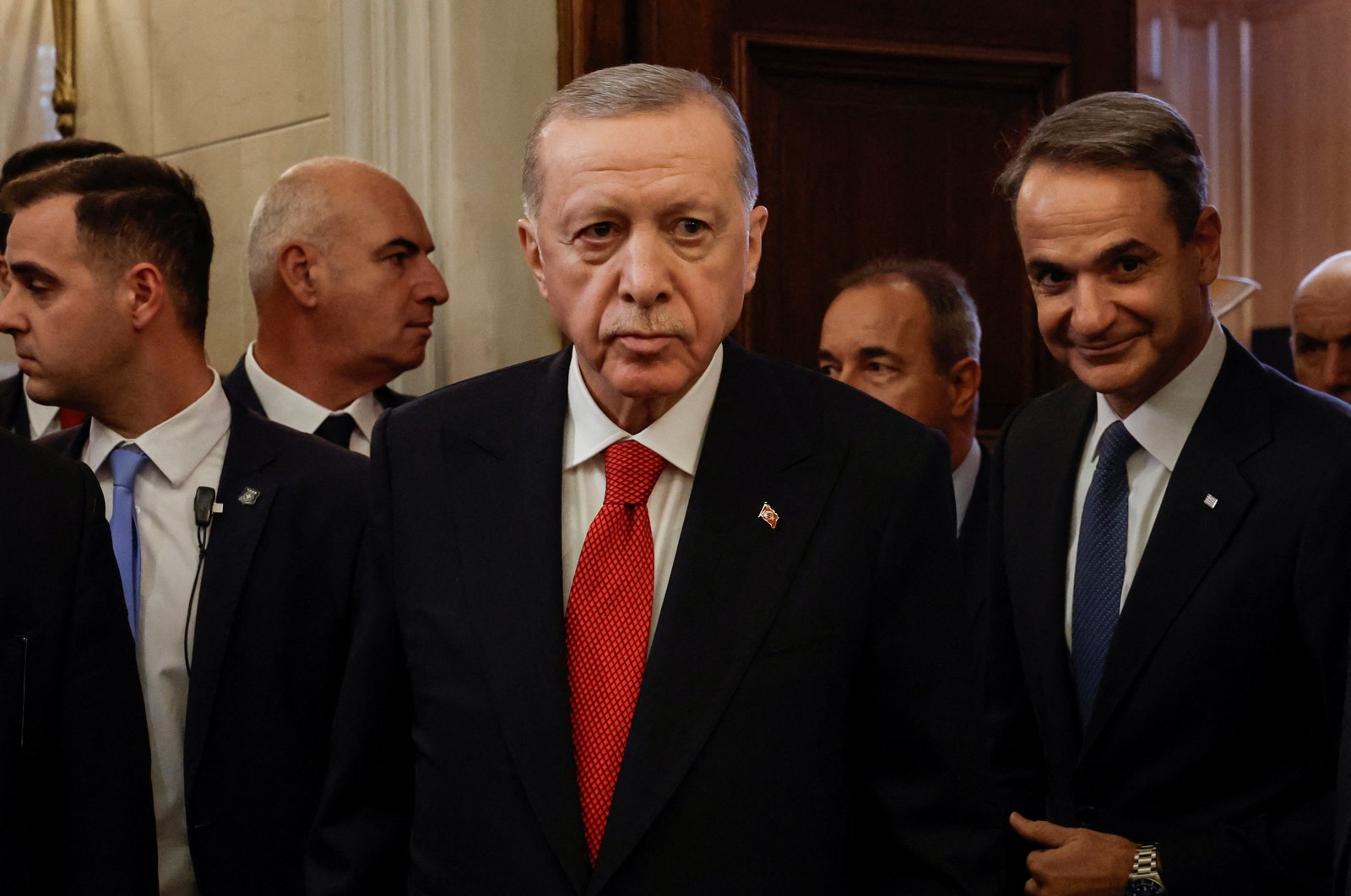 President Recep Tayyip Erdoğan (C) and Greek Prime Minister Kyriakos Mitsotakis arrive for a press conference at the Maximos Mansion in Athens, Greece, Dec. 7, 2023. (Reuters Photo)