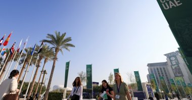 People walk at Dubai's Expo City during the United Nations Climate Change Conference (COP28) in Dubai, United Arab Emirates, Dec. 10, 2023. (Reuters Photo)