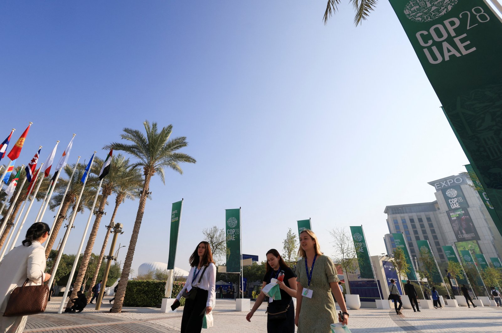 People walk at Dubai&#039;s Expo City during the United Nations Climate Change Conference (COP28) in Dubai, United Arab Emirates, Dec. 10, 2023. (Reuters Photo)