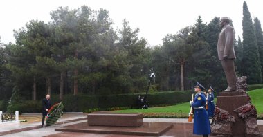 President Ilham Aliyev leaves a wreath at the grave of his father Heydar Aliyev, in Baku, Azerbaijan, Dec. 12, 2023. (AA Photo)