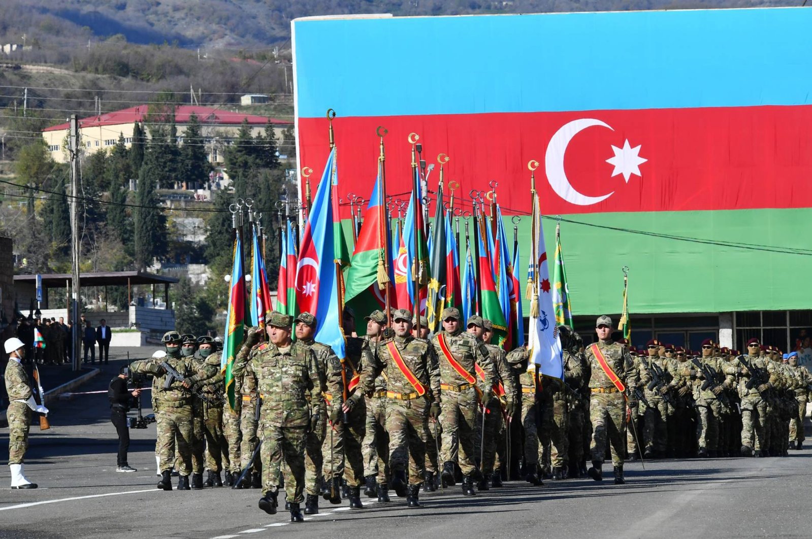 The Azerbaijani troops march during a parade dedicated to the third anniversary of the victory in the war in Khankendi, in Nagorno-Karabakh, Azerbaijan, Nov. 8, 2023. (AP Photo)