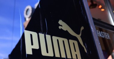 The logo of Puma SE displayed in the window of the flagship store, Berlin, Germany, March 1, 2023. (Getty Images Photo)