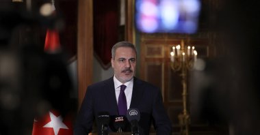 Foreign Minister Hakan Fidan is seen speaking to the press in Washington, U.S., Dec. 7, 2023. (AA Photo)