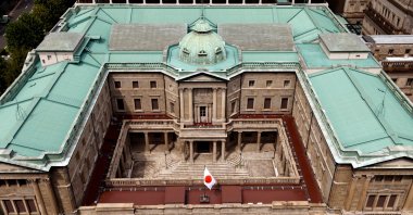 Japanese national flag is hoisted atop the headquarters of Bank of Japan in Tokyo, Japan, Sept. 20, 2023. (Reuters Photo)