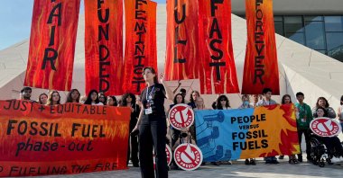 Climate activists protest after a draft of a negotiation deal was released, at the United Nations Climate Change Conference COP28 in Dubai, United Arab Emirates, Dec. 13, 2023. (Reuters Photo)