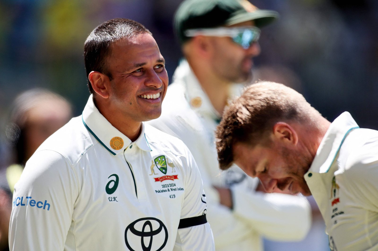 Australia’s Usman Khawaja (L) and teammate David Warner during the first day of the first Test against Pakistan, Perth, Australia, Dec. 14, 2023. (AFP Photo)