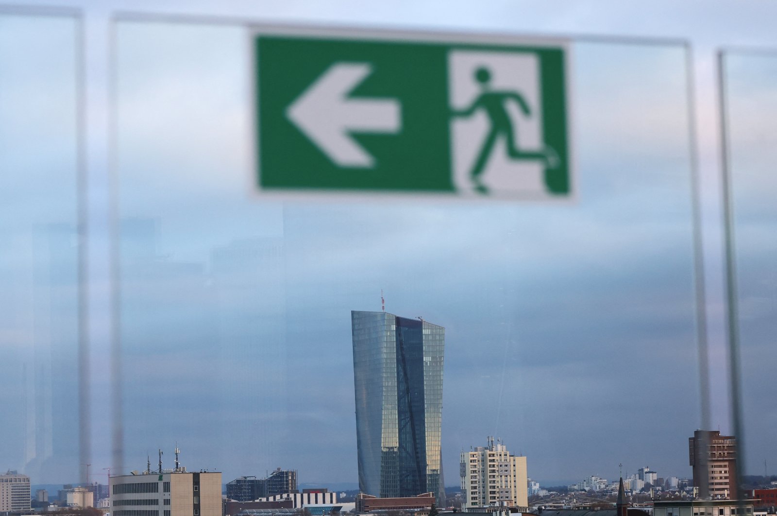 The building of the European Central Bank (ECB) appears behind an emergency sign in Frankfurt, Germany, Dec. 2, 2023. (Reuters Photo)