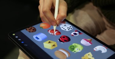 A game developer works on a tablet at a technopark in Izmir, western Türkiye, March 25, 2021. (AA Photo)