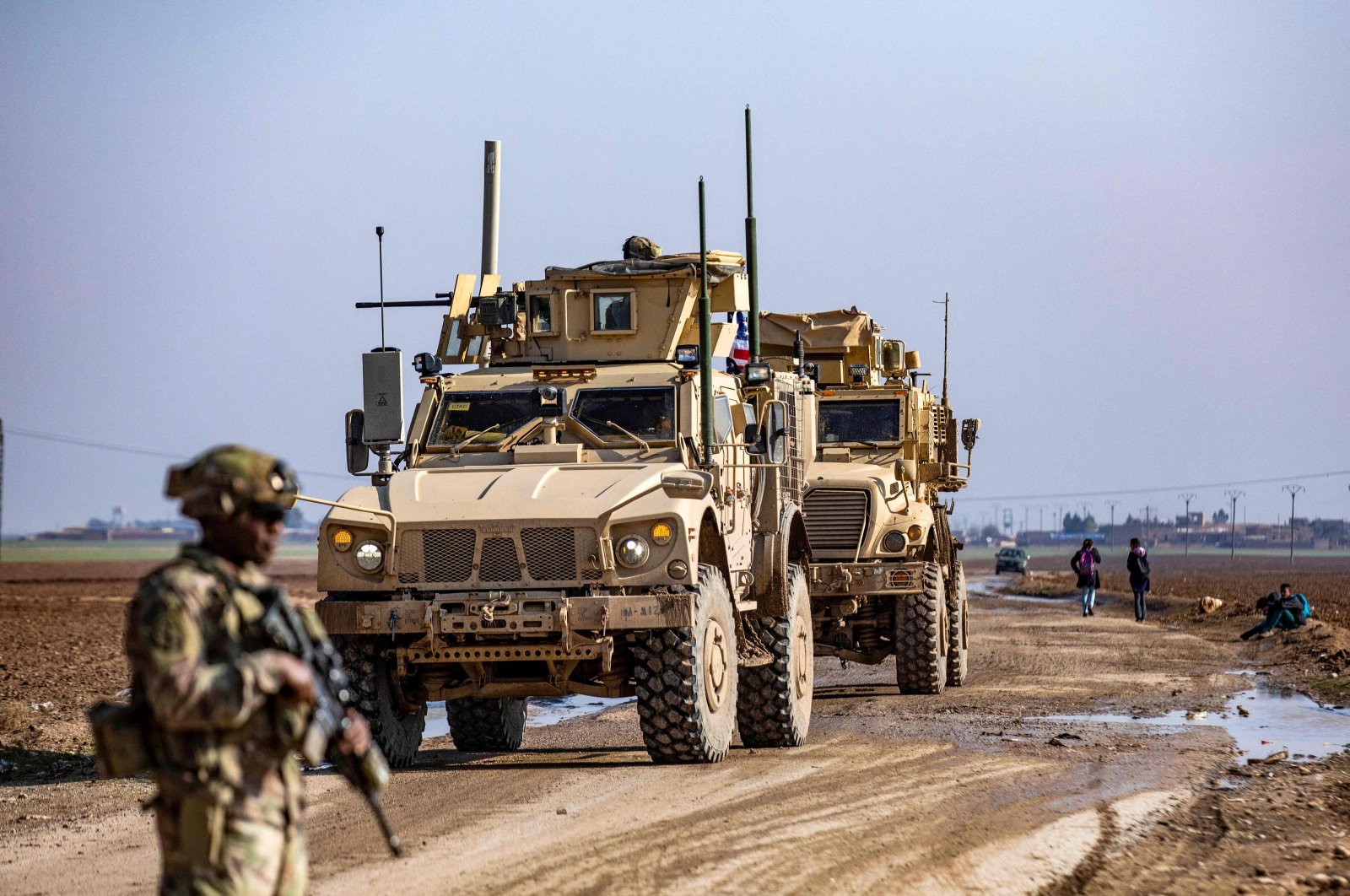 U.S. soldiers patrol an area on the outskirts of Rumaylan controlled by PKK/YPG terrorists, Syria, Dec. 12, 2023. (AFP Photo)