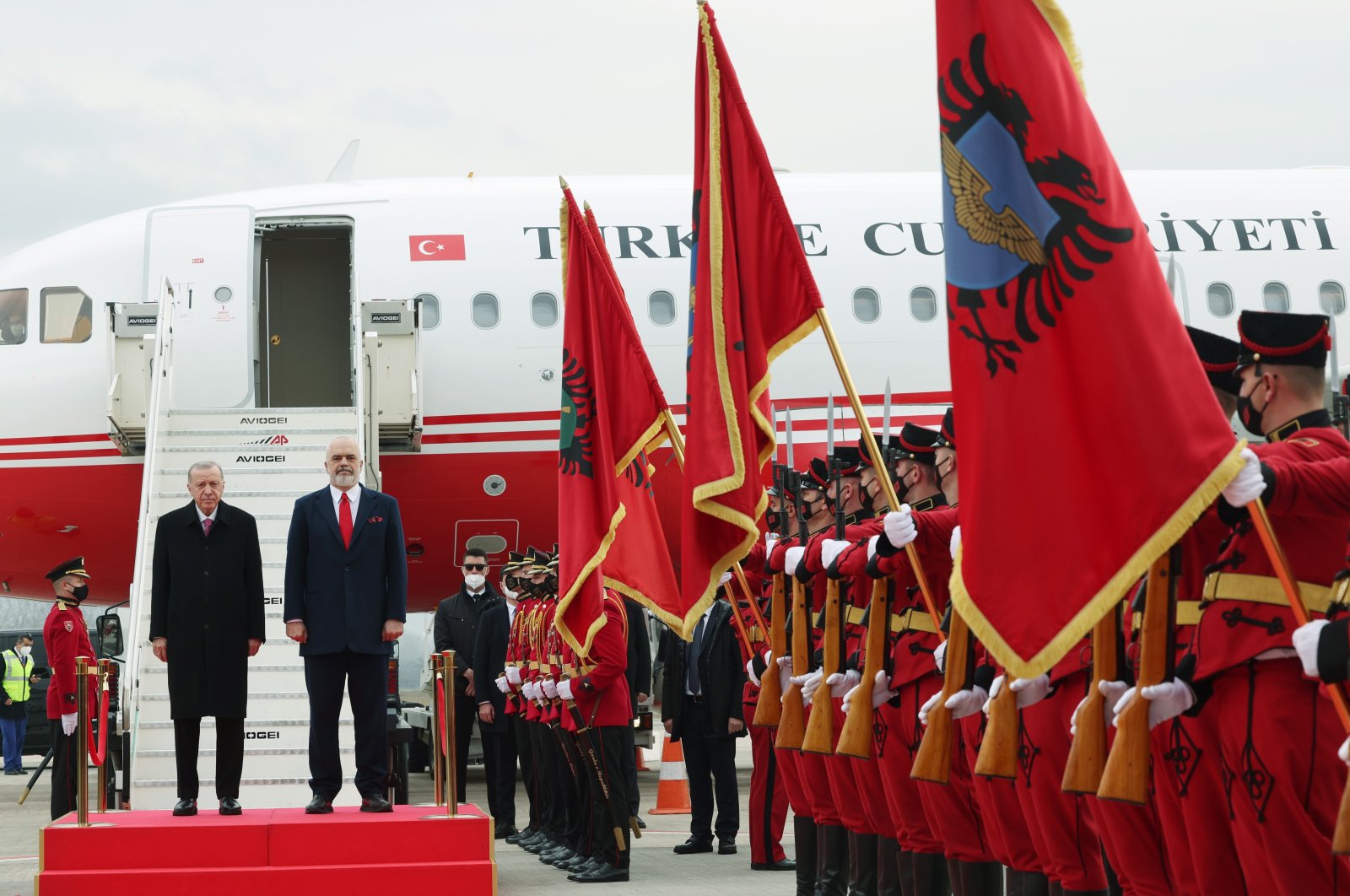 President Recep Tayyip Erdogan (L) is welcomed by Albanian Prime Minister Edi Rama and a military procession in the capital Tirana, Albania, Jan. 18, 2022. (AA Photo)