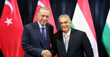 President Recep Tayyip Erdoğan (L) shakes hands with Hungarian Prime Minister Viktor Orban, in Budapest, Hungary, Aug. 20, 2023. (Reuters Photo)