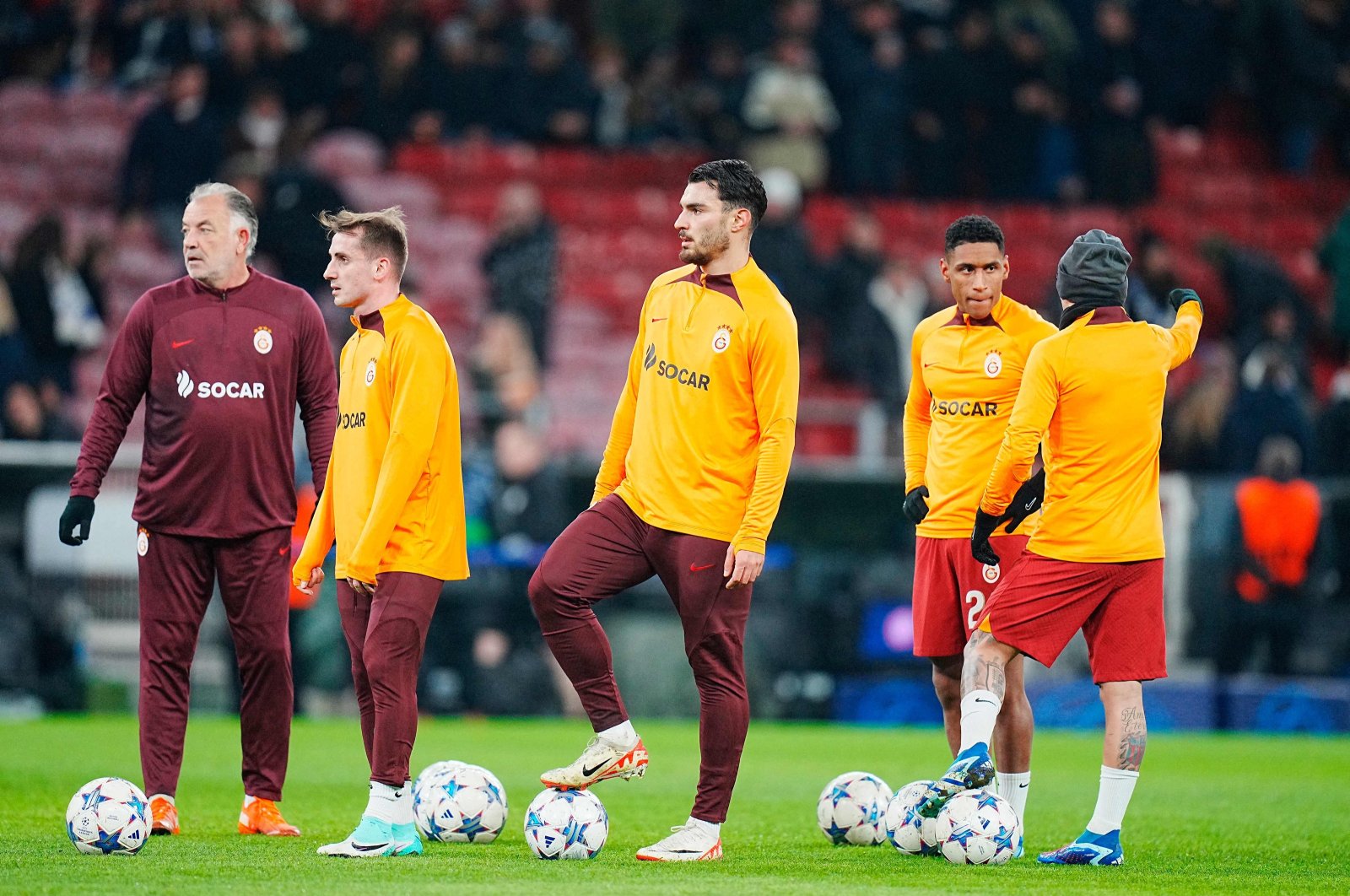 Galatasaray&#039;s players warm up before a Champions League match against Copenhagen, Copenhagen, Dec. 12, 2023. (AFP Photo)