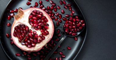 It is commonly believed that the pomegranate is a celestial fruit, and one of its seeds or a drop of its juice is thought to come from the pomegranates in heaven. (Getty Images Photo)