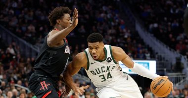 Milwaukee Bucks' Giannis Antetokounmpo (R) drives to the basket during the first half of the game against the Houston Rockets at Fiserv Forum, Milwaukee, Wisconsin, U.S., Dec. 17, 2023. (Getty Images Photo)