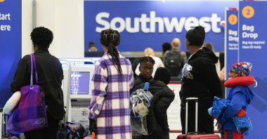 Travelers check in at Southwest Airlines at George Bush Intercontinental Airport, Houston, Texas, U.S., Nov. 21, 2023. (AP Photo)