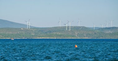 Wind turbines are seen in Sığacık, a seaside neighborhood of Seferihisar district in Izmir, western Türkiye, Dec. 14, 2020. (Shutterstock Photo)