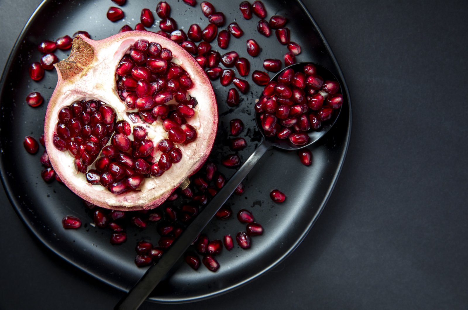 It is commonly believed that the pomegranate is a celestial fruit, and one of its seeds or a drop of its juice is thought to come from the pomegranates in heaven. (Getty Images Photo)