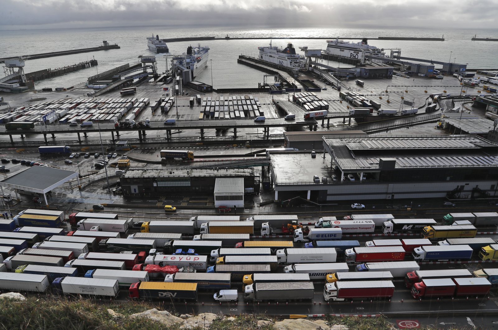 Lorries queue at check-in at the port in Dover, Britain, Dec. 11, 2020. (AP Photo)