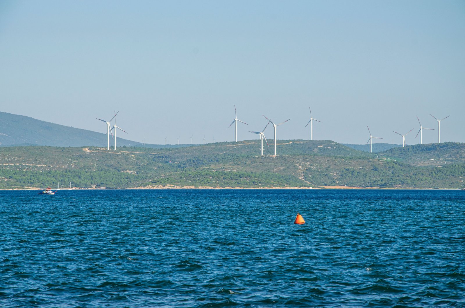 Wind turbines are seen in Sığacık, a seaside neighborhood of Seferihisar district in Izmir, western Türkiye, Dec. 14, 2020. (Shutterstock Photo)