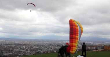 Paragliding enthusiasts from Bursa are enjoying paragliding on Kırantepe, Serdivan, Sakarya, Türkiye, Dec. 19, 2023. (AA Photo) 