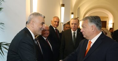 Trade Minister Ömer Bolat (L) shakes hands with Hungarian Prime Minister Viktor Orban, Budapest, Hungary, Dec. 18, 2023. (AA Photo)