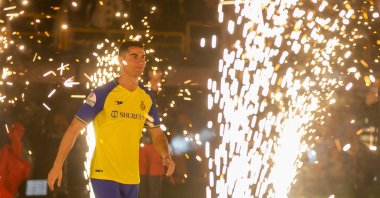 Cristiano Ronaldo greets fans during his unveiling as a new Al-Nassr player at the Mrsool Park Stadium, Riyadh, Saudi Arabia, Jan. 3, 2023. (Getty Images Photo)