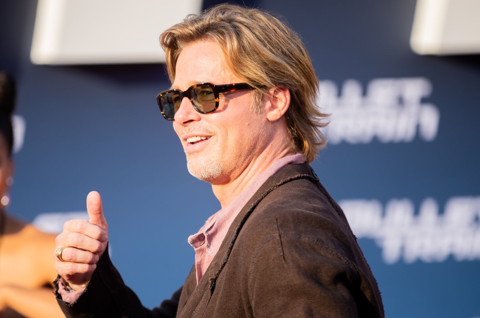 Brad Pitt gives a thumbs up as he arrives at the German premiere of the feature film &quot;Bullet Train&quot; at the Zoopalast, Berlin, Germany, July 19, 2022. (Getty Images Photo)