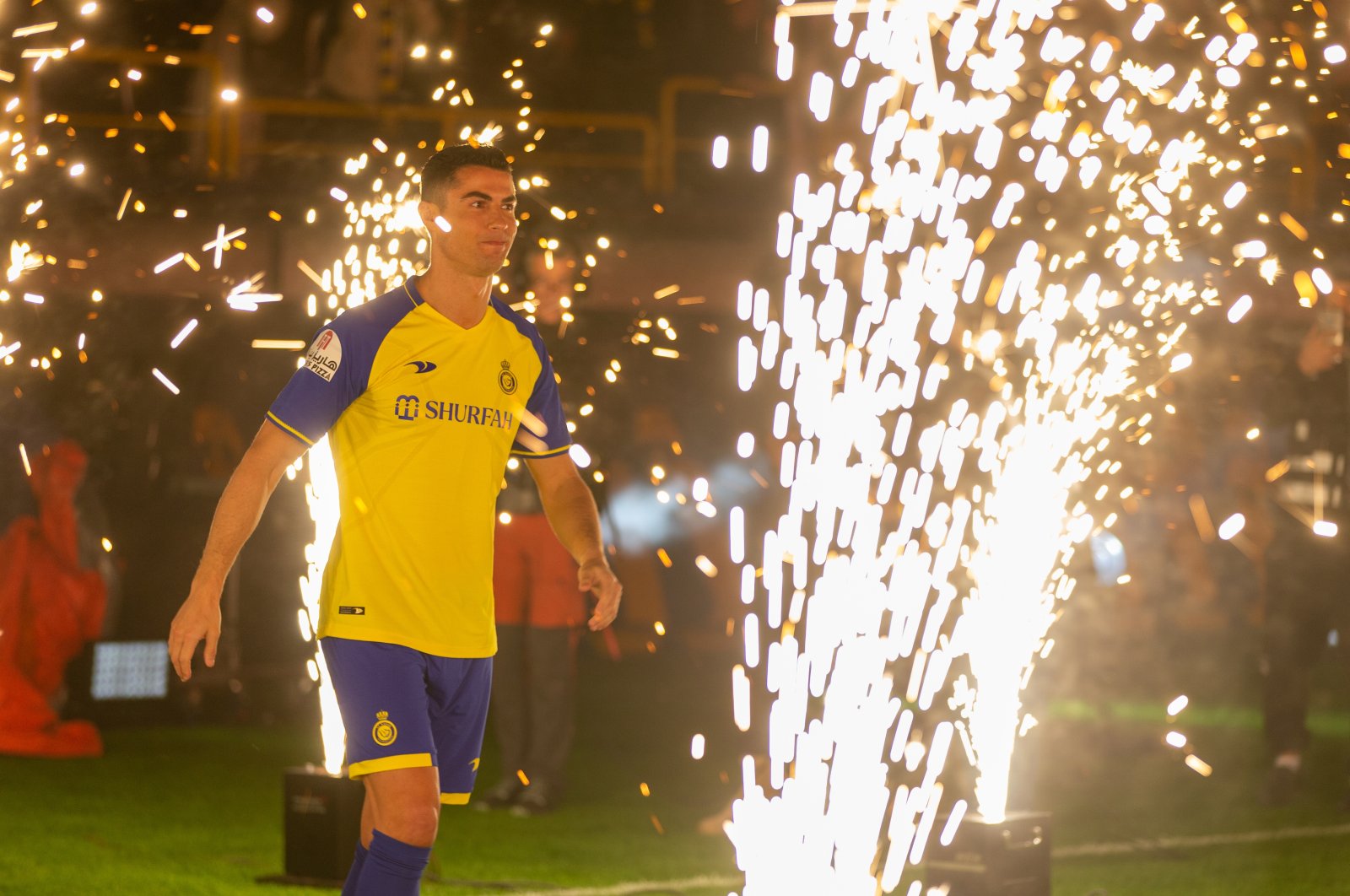 Cristiano Ronaldo greets fans during his unveiling as a new Al-Nassr player at the Mrsool Park Stadium, Riyadh, Saudi Arabia, Jan. 3, 2023. (Getty Images Photo)