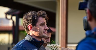 Turkish referee Halil Umut Meler walks after being discharged from the hospital, Izmir, Türkiye, Dec. 13, 2023. (AA Photo)