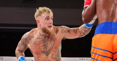 Jake Paul throws a punch against Andre August at the Caribe Royale Orlando, Orlando, Florida, U.S., Dec. 15, 2023. (Getty Images Photo)