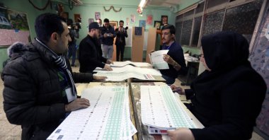 Election committee staff members count the votes at a polling station in Karada district, Baghdad, Iraq, Dec. 18, 2023. (EPA Photo)