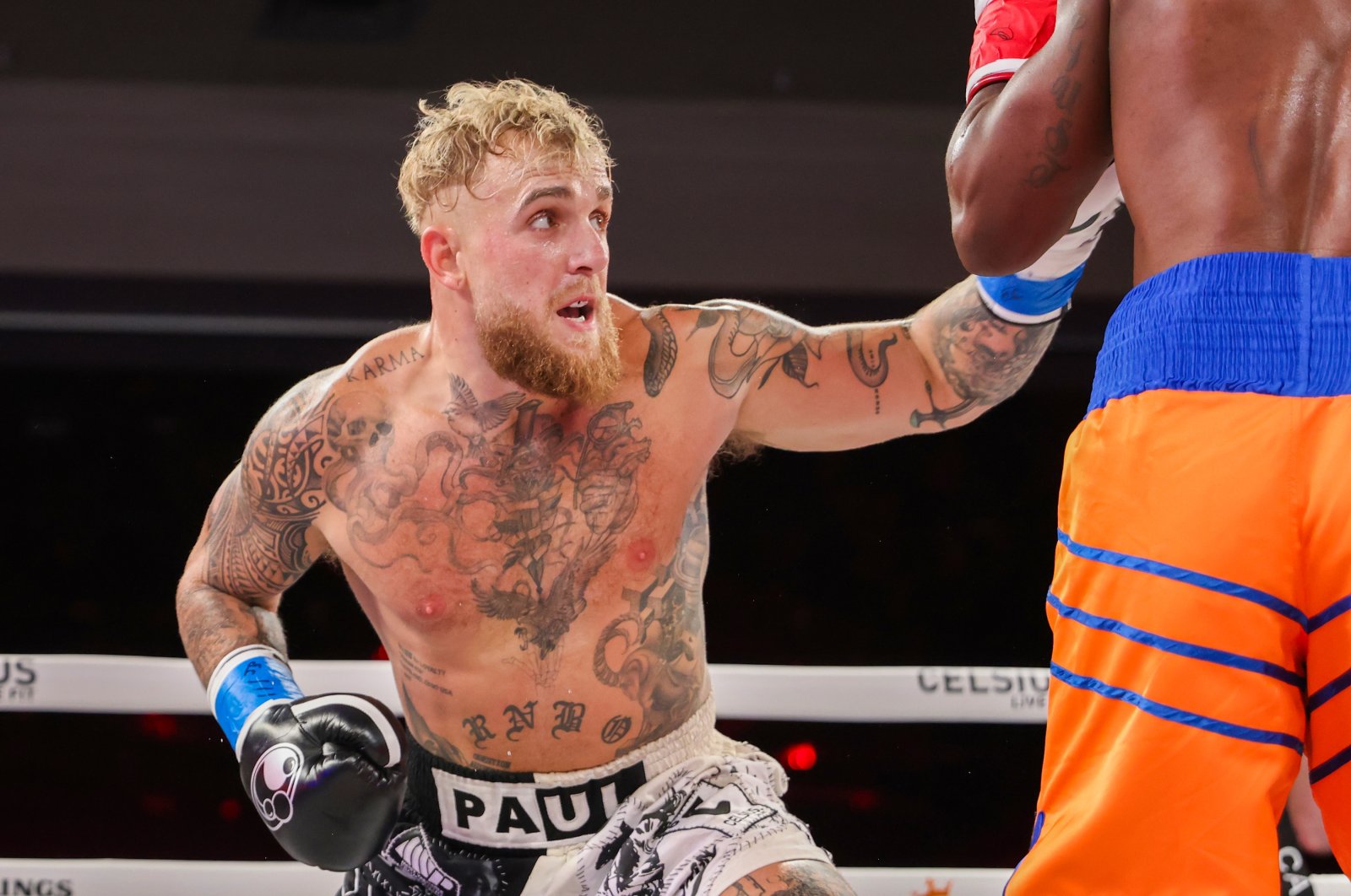 Jake Paul throws a punch against Andre August at the Caribe Royale Orlando, Orlando, Florida, U.S., Dec. 15, 2023. (Getty Images Photo)