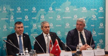 Türkiye’s ambassador to Serbia Hami Aksoy is seen together with YEE Deputy Chairperson Kutalmış Yalçın and YEE Serbia Coordinator Dinser Şahin in Belgrade, Serbia, Dec. 20, 2023 (AA Photo)