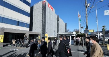 Officials from Japan&#039;s Ministry of Land, Infrastructure, Transport and Tourism enter the Daihatsu Motor headquarters for inspection work in Ikeda, Osaka Prefecture, Japan, Dec. 21, 2023. (AFP Photo)