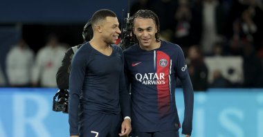 Kylian Mbappe (L) and his brother Ethan Mbappe of PSG following the Ligue 1 match against Metz (FCM) at Parc des Princes stadium, Paris, France, Dec. 20, 2023. (Getty Images Photo)