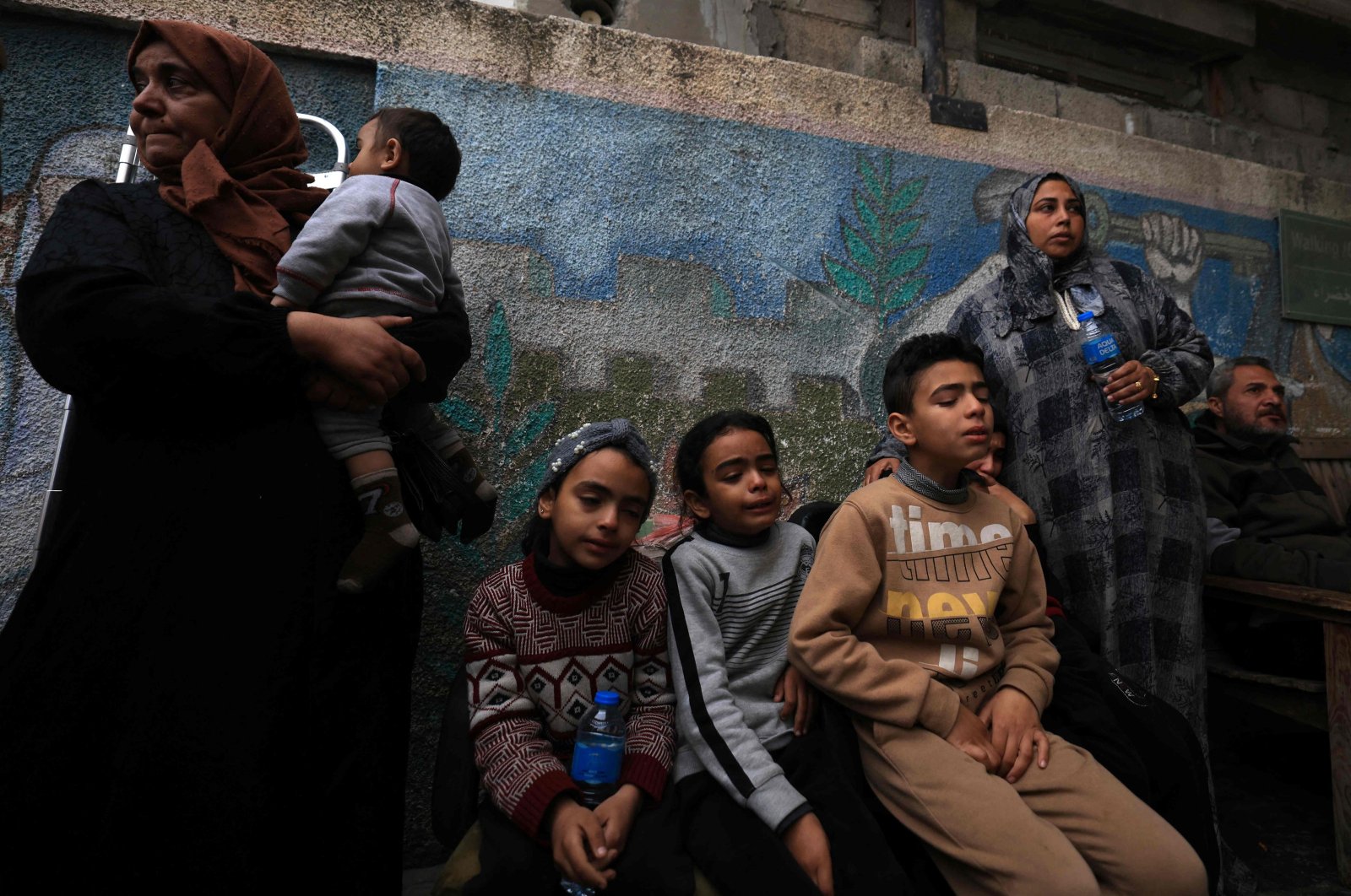 Relatives of a deceased Palestinian mourn in Rafah, southern Gaza Strip, Palestine, Dec. 21, 2023. (AFP Photo)