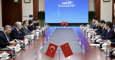 Industry and Technology Minister Mehmet Fatih Kacır holds talks with Chinese Minister of Science and Technology Yin Hejun, in Beijing, China, Dec. 20, 2023. (AA Photo)