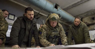 Ukrainian President Volodymyr Zelenskyy (L) taking part in a meeting with commanders near a front line close to Kupiansk, Kharkiv region, Ukraine, Nov. 30, 2023. (EPA Photo)