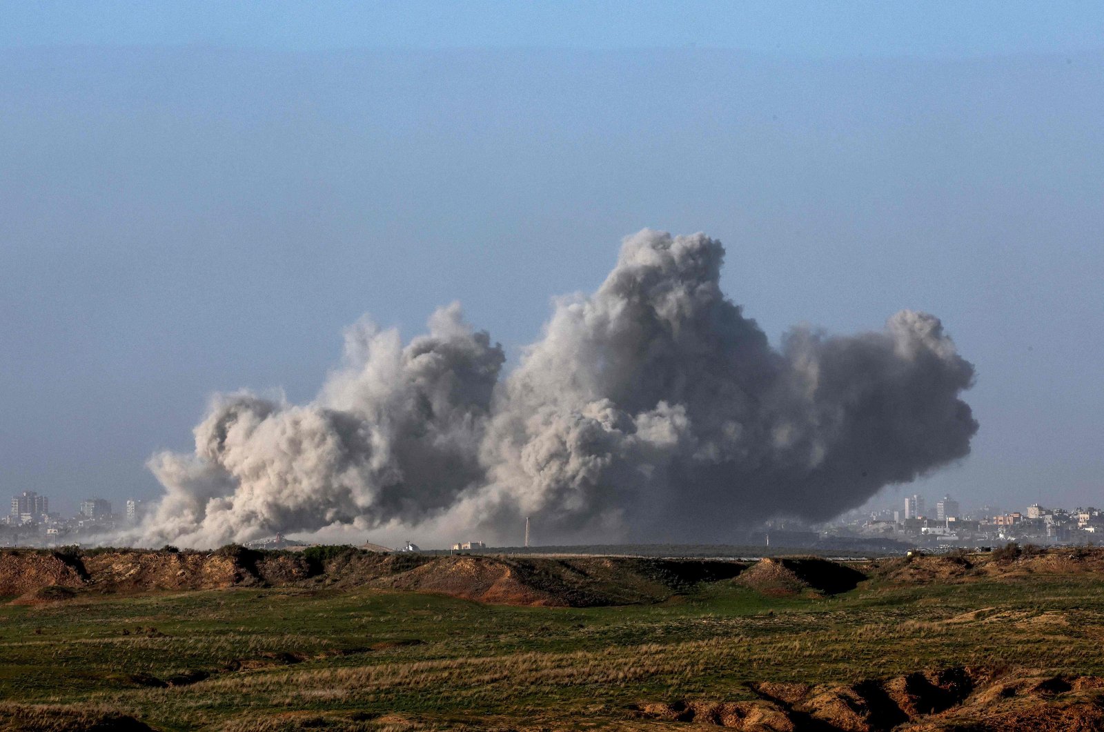 A picture taken from southern Israel bordering the Gaza Strip shows smoke billowing following Israeli bombardment in the Palestinian territory, Dec. 22, 2023. (AFP Photo)