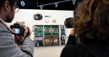 Journalists take pictures of components of the MareNostrum 5 supercomputer, during a press visit of the Supercomputing Centre in Barcelona, Spain, Dec. 15, 2023. (AFP Photo)